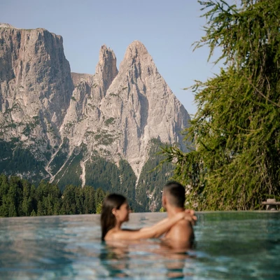 A little pause for two, with nothing but the majestic mountains stretching out before you.